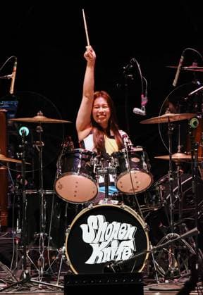 Shonen Knife, Risa Kawano on stage for Men At Work Summer 2026 Concert Tour, Cobb Energy Performing Arts Centre, Atlanta, GA, July 21, 2026. Photo By: Derek Storm Everett Collection Men At Work Summer 2026 Concert Tour PUBLICATIONXNOTxINxCANxCHNxFRAxITAxJPNxNORxPOLxRUSxESPxUKxUSA