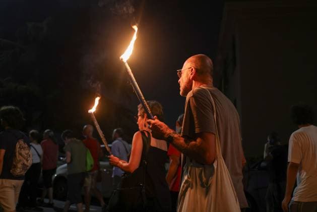 Vigil marks 25th anniversary of Diaz school raid in Genoa GENOA, ITALY JULY 21, 2026: People attend a remembrance vigil marking the 25th anniversary of the police raid on the Diaz school during the 2001 G8 summit in Genoa. The gathering commemorated those injured in the operation and called attention to concerns over police violence and the suppression of dissent during the summit protests. Genova Berlin Italy Copyright: x xZairaxBiaginix xJNAxPressx