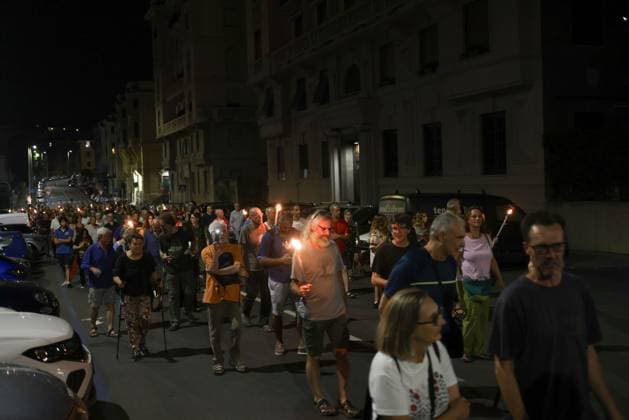 Vigil marks 25th anniversary of Diaz school raid in Genoa GENOA, ITALY JULY 21, 2026: People attend a remembrance vigil marking the 25th anniversary of the police raid on the Diaz school during the 2001 G8 summit in Genoa. The gathering commemorated those injured in the operation and called attention to concerns over police violence and the suppression of dissent during the summit protests. Genova Berlin Italy Copyright: x xZairaxBiaginix xJNAxPressx