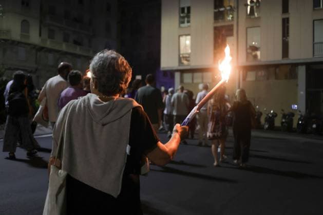Vigil marks 25th anniversary of Diaz school raid in Genoa GENOA, ITALY JULY 21, 2026: People attend a remembrance vigil marking the 25th anniversary of the police raid on the Diaz school during the 2001 G8 summit in Genoa. The gathering commemorated those injured in the operation and called attention to concerns over police violence and the suppression of dissent during the summit protests. Genova Berlin Italy Copyright: x xZairaxBiaginix xJNAxPressx