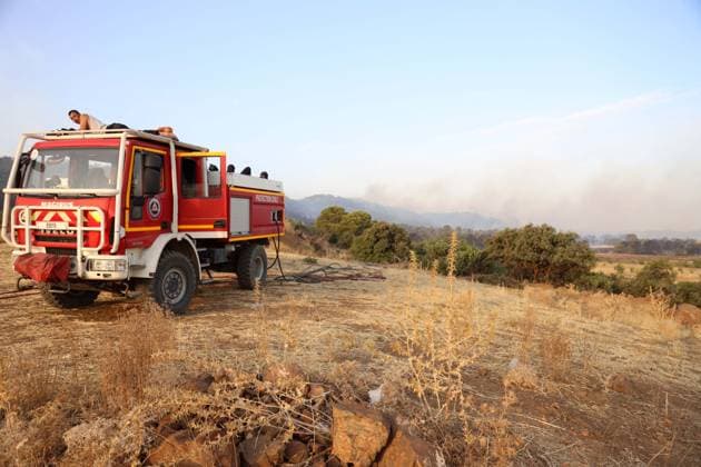 Forest Rangers Battle Wildfires In Bouira - Algeria Protection Civile firefighters intervene to extinguish wildfires in the mountains of Bouira, Algeria on July 21, 2026, as the blazes are reported under control according to the civil protection agency. Photo by Billel Bensalem APP ABACAPRESS.COM Bouira Algeria  Copyright: xBensalemxBillel APP ABACAx