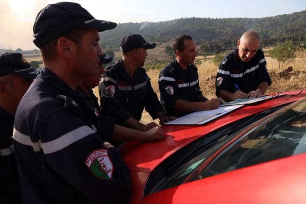 Forest Rangers Battle Wildfires In Bouira - Algeria Protection Civile firefighters intervene to extinguish wildfires in the mountains of Bouira, Algeria on July 21, 2026, as the blazes are reported under control according to the civil protection agency. Photo by Billel Bensalem APP ABACAPRESS.COM Bouira Algeria  Copyright: xBensalemxBillel APP ABACAx