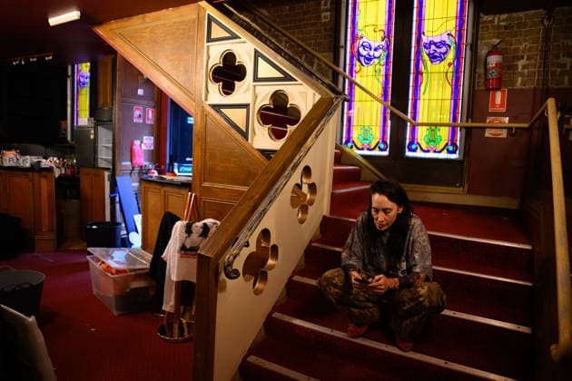 DIVINE PLAYHOUSE EVICTION, Devine Playhouse founder and creative director Kat Dopper takes a break from cleaning an packing at the former church turned LGBTQ arts space, the Devine Playhouse, in Sydney, Wednesday, July 22, 2026. The group has been forced out of the space after the owners of the deconsecrated church in Sydney s CBD have terminated the lease following complaints from some members of the Christian community. ( NO ARCHIVING SYDNEY NEW SOUTH WALES AUSTRALIA  Copyright: xDANxHIMBRECHTSx 20260722172884135132
