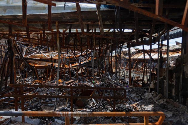 Burnt-out pavilions are at the market near the Lukianivska metro station, which reopened after the recent massive Russian bombardment, Kyiv, Ukraine, July 21, 2026. On Sunday night, July 19, 2026, Russia launched a massive missile strike on the Ukrainian capital. The Lukianivka historical neighbourhood was hit again. The strike damaged the Lukianivska metro station, its vestibule and foyer, and wrecked the Lukianivka market. The underground passage on Yuriia Illienka Street was also directly struck. (Photo by Kyrylo Chubotin Ukrinform) Lukianivka neighbourhood in Kyiv recovers from massive Russian attack  Copyright: xKyryloxChubotinx