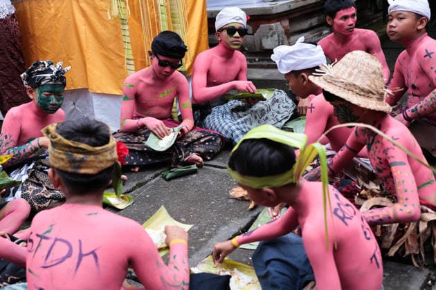 Ngerebeg ritual, a colorful tradition in Bali BALI, INDONESIA - JULY 22: Locals with painted bodies participate in the Ngerebeg ritual, a colorful traditional procession believed to expel evil spirits and bad luck from the village, on July 22, 2026 in Bali, Indonesia. Participants paint their bodies to resemble astral beings as they pray and march through the village. Johannes P. Christo Anadolu Bali Indonesia. Editorial use only. Please get in touch for any other usage.  Copyright: x2026xAnadoluxJohannesxP.xChristox