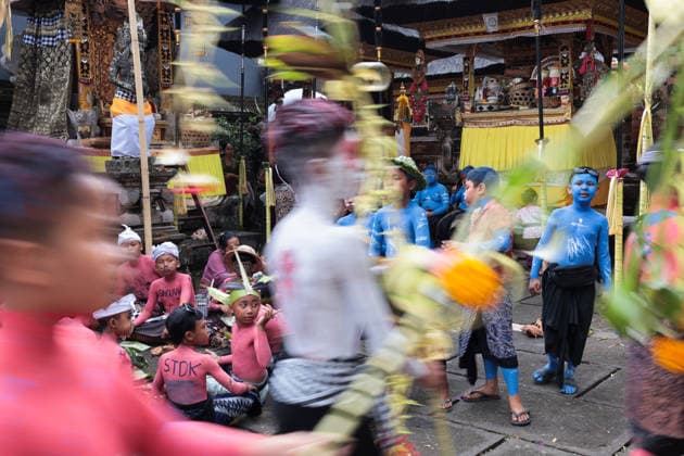 Ngerebeg ritual, a colorful tradition in Bali BALI, INDONESIA - JULY 22: Locals with painted bodies participate in the Ngerebeg ritual, a colorful traditional procession believed to expel evil spirits and bad luck from the village, on July 22, 2026 in Bali, Indonesia. Participants paint their bodies to resemble astral beings as they pray and march through the village. Johannes P. Christo Anadolu Bali Indonesia. Editorial use only. Please get in touch for any other usage.  Copyright: x2026xAnadoluxJohannesxP.xChristox