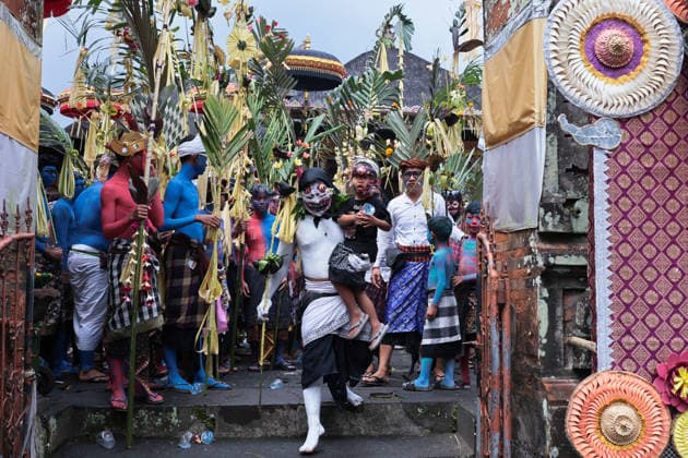 Ngerebeg ritual, a colorful tradition in Bali BALI, INDONESIA - JULY 22: Locals with painted bodies participate in the Ngerebeg ritual, a colorful traditional procession believed to expel evil spirits and bad luck from the village, on July 22, 2026 in Bali, Indonesia. Participants paint their bodies to resemble astral beings as they pray and march through the village. Johannes P. Christo Anadolu Bali Indonesia. Editorial use only. Please get in touch for any other usage.  Copyright: x2026xAnadoluxJohannesxP.xChristox