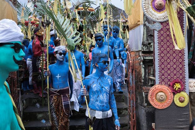 Ngerebeg ritual, a colorful tradition in Bali BALI, INDONESIA - JULY 22: Locals with painted bodies participate in the Ngerebeg ritual, a colorful traditional procession believed to expel evil spirits and bad luck from the village, on July 22, 2026 in Bali, Indonesia. Participants paint their bodies to resemble astral beings as they pray and march through the village. Johannes P. Christo Anadolu Bali Indonesia. Editorial use only. Please get in touch for any other usage.  Copyright: x2026xAnadoluxJohannesxP.xChristox