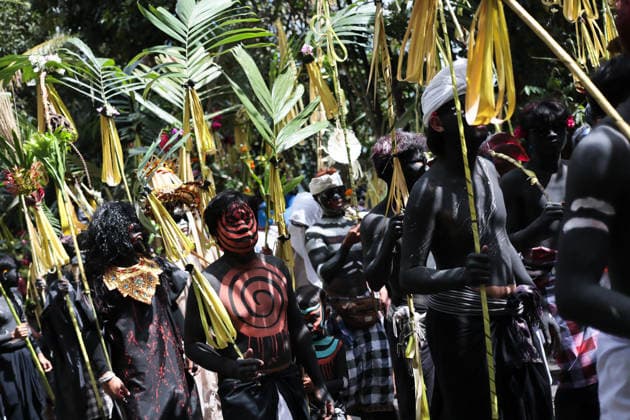 Ngerebeg ritual, a colorful tradition in Bali BALI, INDONESIA - JULY 22: Locals with painted bodies participate in the Ngerebeg ritual, a colorful traditional procession believed to expel evil spirits and bad luck from the village, on July 22, 2026 in Bali, Indonesia. Participants paint their bodies to resemble astral beings as they pray and march through the village. Johannes P. Christo Anadolu Bali Indonesia. Editorial use only. Please get in touch for any other usage.  Copyright: x2026xAnadoluxJohannesxP.xChristox