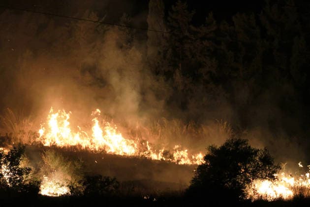 Wildfires continue in Italian island of Sicily PALERMO, ITALY - JULY 22: Wildfires that broke out in several parts of the Italian island of Sicily continue overnight, fueled by strong winds, as firefighters, civil protection teams and forestry crews press on with efforts to contain the blazes near Palermo, Sicily, Italy on July 22, 2026. The wildfires, which started yesterday on the slopes of Mount Longa near the city of Palermo, spread rapidly due to the wind and burned throughout the night. Alberto Lo Bianco Anadolu Palermo Italy. Editorial use only. Please get in touch for any other usage.  Copyright: x2026xAnadoluxAlbertoxLoxBiancox