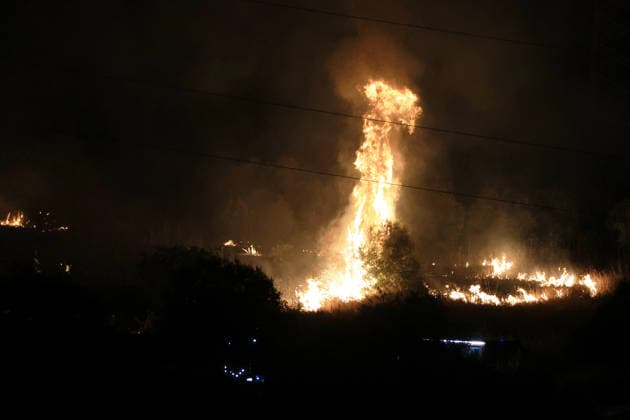 Wildfires continue in Italian island of Sicily PALERMO, ITALY - JULY 22: Wildfires that broke out in several parts of the Italian island of Sicily continue overnight, fueled by strong winds, as firefighters, civil protection teams and forestry crews press on with efforts to contain the blazes near Palermo, Sicily, Italy on July 22, 2026. The wildfires, which started yesterday on the slopes of Mount Longa near the city of Palermo, spread rapidly due to the wind and burned throughout the night. Alberto Lo Bianco Anadolu Palermo Italy. Editorial use only. Please get in touch for any other usage.  Copyright: x2026xAnadoluxAlbertoxLoxBiancox