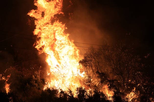 Wildfires continue in Italian island of Sicily PALERMO, ITALY - JULY 22: Wildfires that broke out in several parts of the Italian island of Sicily continue overnight, fueled by strong winds, as firefighters, civil protection teams and forestry crews press on with efforts to contain the blazes near Palermo, Sicily, Italy on July 22, 2026. The wildfires, which started yesterday on the slopes of Mount Longa near the city of Palermo, spread rapidly due to the wind and burned throughout the night. Alberto Lo Bianco Anadolu Palermo Italy. Editorial use only. Please get in touch for any other usage.  Copyright: x2026xAnadoluxAlbertoxLoxBiancox