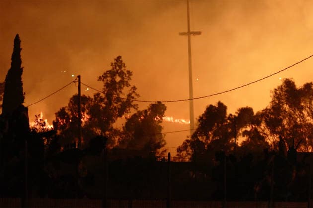 Wildfires continue in Italian island of Sicily PALERMO, ITALY - JULY 22: Wildfires that broke out in several parts of the Italian island of Sicily continue overnight, fueled by strong winds, as firefighters, civil protection teams and forestry crews press on with efforts to contain the blazes near Palermo, Sicily, Italy on July 22, 2026. The wildfires, which started yesterday on the slopes of Mount Longa near the city of Palermo, spread rapidly due to the wind and burned throughout the night. Alberto Lo Bianco Anadolu Palermo Italy. Editorial use only. Please get in touch for any other usage.  Copyright: x2026xAnadoluxAlbertoxLoxBiancox