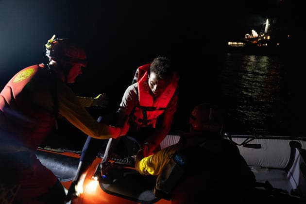 NGO vessel Open Arms rescues Somali migrants in the Central Mediterranean CENTRAL MEDITERRANEAN - JULY 22: A small rubber boat carrying six Somali migrants, including two unaccompanied minors, is rescued by the NGO vessel Open Arms in the Central Mediterranean on July 22, 2026. After departing from Libya, the migrants were rescued around 4:00 a.m. local time, and the vessel remained in the Maltese Search and Rescue region awaiting the assignment of a Place of Safety by authorities. Joan Galvez Anadolu At sea At sea. Editorial use only. Please get in touch for any other usage.  Copyright: x2026xAnadoluxJoanxGalvezx