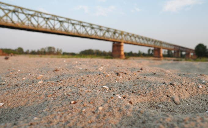 IPA86888838 - Mezzanino, Pavia, Ponte della Becca, July 22, 2026: The Po River has run dry; there is a water emergency and drought affecting Italy’s rivers. The Po River is 3 meters below its normal level, with vast stretches of sand; climate change and global warming  Copyright: xDuilioxPiaggesix xDuilioxPiaggesix 86888838