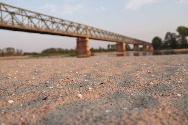 IPA86888841 - Mezzanino, Pavia, Ponte della Becca, July 22, 2026: The Po River has run dry; there is a water emergency and drought affecting Italy’s rivers. The Po River is 3 meters below its normal level, with vast stretches of sand; climate change and global warming.  Copyright: xDuilioxPiaggesix xDuilioxPiaggesix 86888841