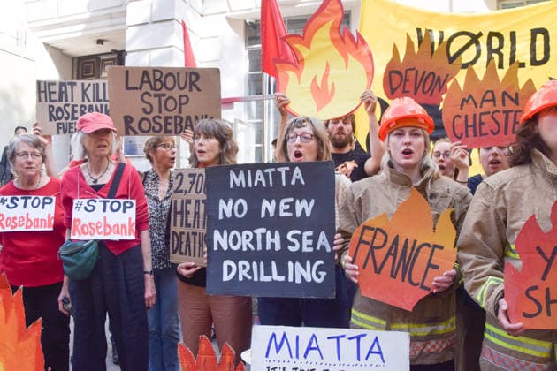 July 22, 2026, London, England, United Kingdom: Climate activists from Fossil Free London stage a protest outside the Department for Energy Security and Net Zero calling on the new Energy Secretary Miatta Fahnbulleh and the new UK Prime Minister Andy Burnham to stop the Rosebank oil and gas field in the North Sea. London United Kingdom - ZUMAv130 20260722_zip_v130_007 Copyright: xVukxValcicx