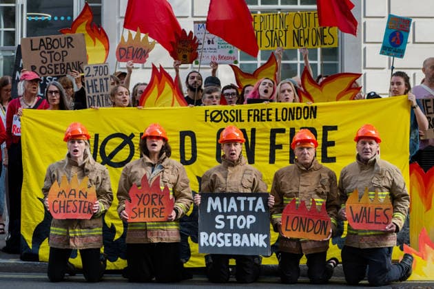 July 22, 2026, London, England, United Kingdom: Climate campaigners from Fossil Free London, Christian Climate Action and the Climate Choir stage a protest outside the Department for Energy Security and Net Zero (DESNZ) in Westminster, calling on the UK government to reject the proposed Rosebank oil field development in the North Sea. London United Kingdom - ZUMAk172 20260722_zip_k172_001 Copyright: xThomasxKrychx