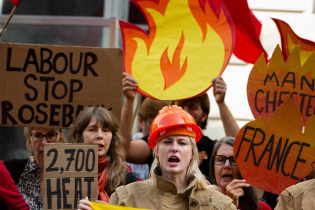 July 22, 2026, London, England, United Kingdom: Climate campaigners from Fossil Free London, Christian Climate Action and the Climate Choir stage a protest outside the Department for Energy Security and Net Zero (DESNZ) in Westminster, calling on the UK government to reject the proposed Rosebank oil field development in the North Sea. London United Kingdom - ZUMAk172 20260722_zip_k172_003 Copyright: xThomasxKrychx