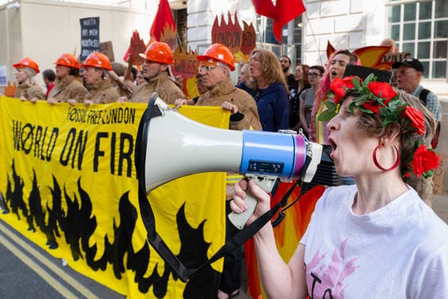 July 22, 2026, London, England, United Kingdom: Climate campaigners from Fossil Free London, Christian Climate Action and the Climate Choir stage a protest outside the Department for Energy Security and Net Zero (DESNZ) in Westminster, calling on the UK government to reject the proposed Rosebank oil field development in the North Sea. London United Kingdom - ZUMAk172 20260722_zip_k172_004 Copyright: xThomasxKrychx