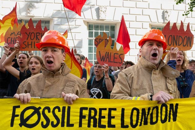 July 22, 2026, London, England, United Kingdom: Climate campaigners from Fossil Free London, Christian Climate Action and the Climate Choir stage a protest outside the Department for Energy Security and Net Zero (DESNZ) in Westminster, calling on the UK government to reject the proposed Rosebank oil field development in the North Sea. London United Kingdom - ZUMAk172 20260722_zip_k172_013 Copyright: xThomasxKrychx