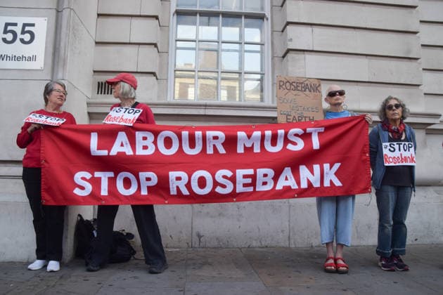July 22, 2026, London, England, United Kingdom: Climate activists stage a protest outside the Department for Energy Security and Net Zero calling on the Labour government to stop the Rosebank oil and gas field in the North Sea. London United Kingdom - ZUMAv130 20260722_zip_v130_019 Copyright: xVukxValcicx