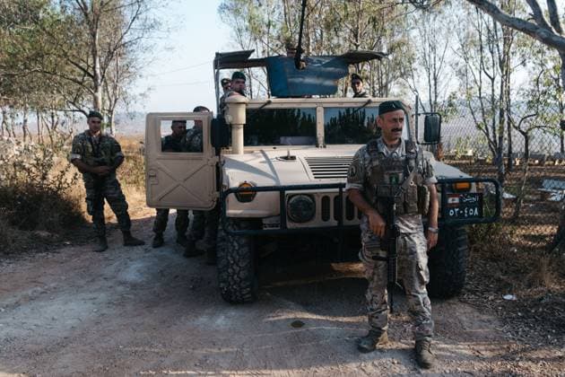 July 22, 2026, Zawtar Al-Gharbiya, Lebanon: ZAWTAR AL-GHARBIYA, LEBANON Ã¢â‚¬ JULY 22, 2026: The Lebanese army deploys in Zawtar Al-Gharbiya, southern Lebanon, one of three Ã¢â‚¬oepilot zonesÃ¢â‚¬Â placed under its control on Tuesday as part of a U.S.-brokered agreement with Israel. As soldiers clear unexploded ordnance, villagers wait behind a security cordon on the outskirts of the village for permission to return. Zawtar Al-Gharbiya Lebanon - ZUMAq101 20260722_zna_q101_036 Copyright: xKatrinexDigexHoumoÂ¸Llerx