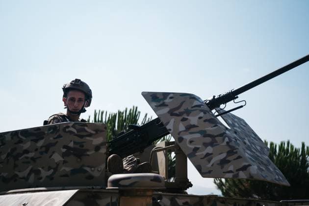 July 22, 2026, Zawtar Al-Gharbiya, Lebanon: ZAWTAR AL-GHARBIYA, LEBANON Ã¢â‚¬ JULY 22, 2026: The Lebanese army deploys in Zawtar Al-Gharbiya, southern Lebanon, one of three Ã¢â‚¬oepilot zonesÃ¢â‚¬Â placed under its control on Tuesday as part of a U.S.-brokered agreement with Israel. As soldiers clear unexploded ordnance, villagers wait behind a security cordon on the outskirts of the village for permission to return. Zawtar Al-Gharbiya Lebanon - ZUMAq101 20260722_zna_q101_038 Copyright: xKatrinexDigexHoumoÂ¸Llerx