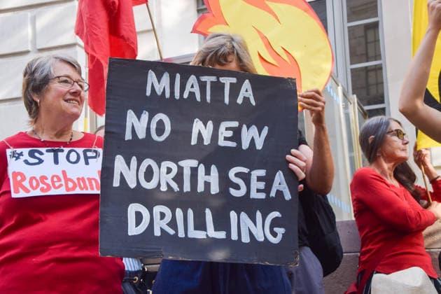 July 22, 2026, London, United Kingdom: A protester holds a Miatta no new North Sea drilling placard during a protest outside the Department for Energy Security and Net Zero (DESNZ) organised by the group Fossil Free London, calling on the new Energy Secretary Miatta Fahnbulleh and the new UK Prime Minister Andy Burnham to stop the Rosebank oil and gas field in the North Sea. London United Kingdom  - ZUMAs197 20260722_aaa_s197_037 Copyright: xVukxValcicx