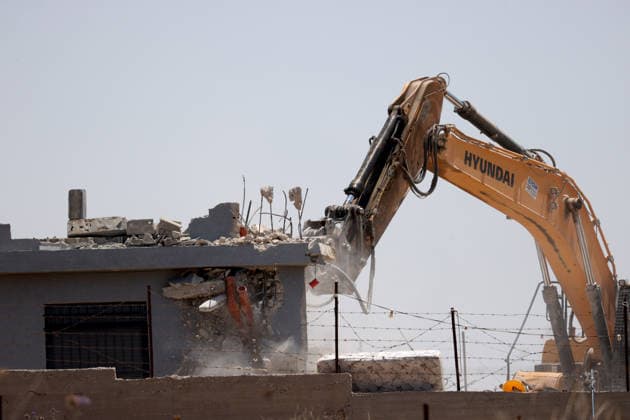 Israeli forces demolish structures in Jerusalem RAFAT, JERUSALEM - JULY 22: Israeli forces, accompanied by bulldozers, carry out a raid in the town of Rafat, northwest of East Jerusalem, on July 22, 2026. During the operation, Israeli authorities demolished a residential house, a car wash facility and two farms, claiming the structures had been built without the required permits. Issam Rimawi Anadolu Jerusalem Rafat. Editorial use only. Please get in touch for any other usage.  Copyright: x2026xAnadoluxIssamxRimawix