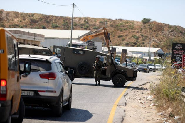 Israeli forces demolish structures in Jerusalem RAFAT, JERUSALEM - JULY 22: Israeli forces, accompanied by bulldozers, carry out a raid in the town of Rafat, northwest of East Jerusalem, on July 22, 2026. During the operation, Israeli authorities demolished a residential house, a car wash facility and two farms, claiming the structures had been built without the required permits. Issam Rimawi Anadolu Jerusalem Rafat. Editorial use only. Please get in touch for any other usage.  Copyright: x2026xAnadoluxIssamxRimawix