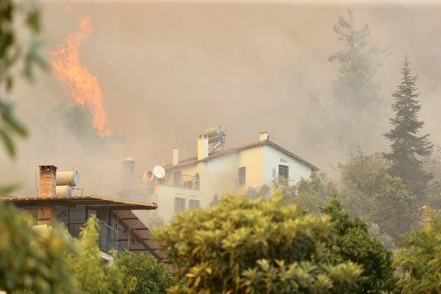Forest Fire Breaks Out in Fethiye MUGLA, TURKIYE - JULY 22: Firefighting crews work to contain a forest fire in the Fethiye district of Mugla, Turkiye, on July 22, 2026. Ali Riza Akkir Anadolu Mugla Turkey. Editorial use only. Please get in touch for any other usage.  Copyright: x2026xAnadoluxAlixRizaxAkkirx