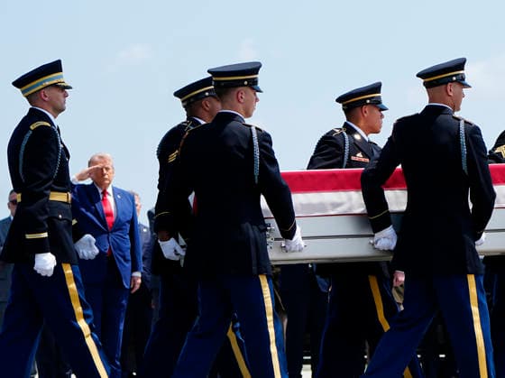 President Donald Trump watches as a U.S. Army carry team carries the transfer case containing the remains of Army 1st Lt. Tyler James Feehan during a dignified transfer at Dover Air Force Base in Dover, Delaware on Wednesday, July 22, 2026. Feehan was one of three soldiers killed as a result of Iranian strikes on Muwaffaq Salti Air Base in Jordan on July 17.  DEL202607222003 BONNIExCASH