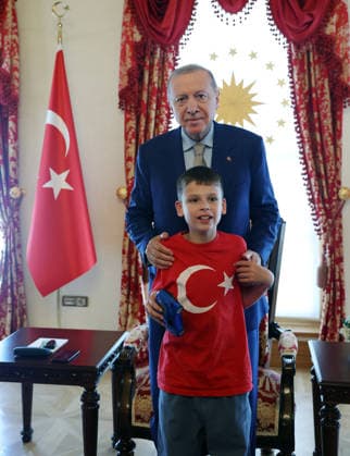 Turkish President Recep Tayyip Erdogan ISTANBUL, TURKIYE - JULY 22: (----EDITORIAL USE ONLY - MANDATORY CREDIT - TURKISH PRESIDENCY MUSTAFA KAMACI HANDOUT - NO MARKETING NO ADVERTISING CAMPAIGNS - DISTRIBUTED AS A SERVICE TO CLIENTS----) Turkish President Recep Tayyip Erdogan meets 12-year-old British activist Joshua Harris, who has autism and is known for his Cake Not Hate campaign against anti-Muslim hate acts, at the Dolmabahce Presidential Working Office in Istanbul, Turkiye on July 22, 2026. TUR Presidency Mustafa Kamaci Anadolu Istanbul Turkey. Editorial use only. Please get in touch for any other usage.  Copyright: x2026xAnadoluxTURxPresidency MustafaxKamacix