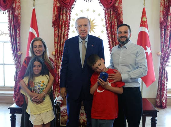 Turkish President Recep Tayyip Erdogan ISTANBUL, TURKIYE - JULY 22: (----EDITORIAL USE ONLY - MANDATORY CREDIT - TURKISH PRESIDENCY MUSTAFA KAMACI HANDOUT - NO MARKETING NO ADVERTISING CAMPAIGNS - DISTRIBUTED AS A SERVICE TO CLIENTS----) Turkish President Recep Tayyip Erdogan meets 12-year-old British activist Joshua Harris, who has autism and is known for his Cake Not Hate campaign against anti-Muslim hate acts, at the Dolmabahce Presidential Working Office in Istanbul, Turkiye on July 22, 2026. TUR Presidency Mustafa Kamaci Anadolu Istanbul Turkey. Editorial use only. Please get in touch for any other usage.  Copyright: x2026xAnadoluxTURxPresidency MustafaxKamacix