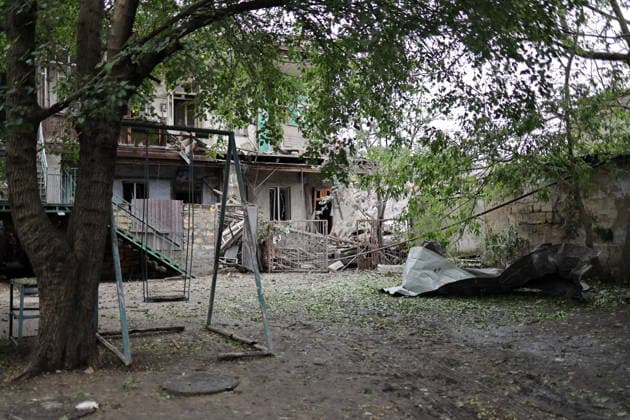 July 22, 2026, Odessa, Ukraine: View of the courtyard of the damaged residential building on Ataman Golovatogo Street. According to city authorities, three people were injured and one was killed as a result of a Russian drone hitting a residential building on Ataman Golovatogo Street. Odessa Ukraine - ZUMAs197 20260722_aaa_s197_055 Copyright: xViacheslavxOnyshchenkox