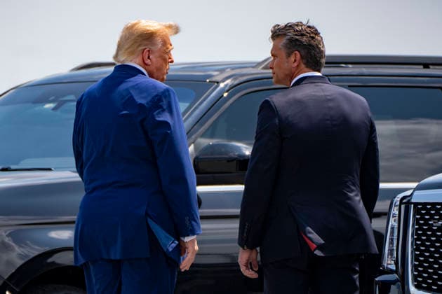 President Donald Trump and Secretary of Defense Pete Hegseth speak after the dignified transfer of Army 1st Lt. Tyler James Feehan, Army Staff Sgt. Emmanuel Swinton, Army Sgt. Angel Rampersad and Army Pvt. Isabella Gonzales at Dover Air Force Base in Dover, Delaware on Wednesday, July 22, 2026.  WAP20260722367 BONNIExCASH