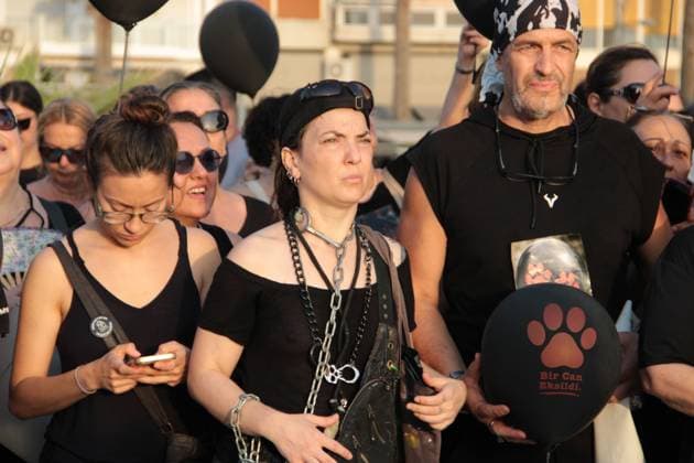 July 22, 2026, Â°Zmir, ToÂ¼rkiye: IZMIR, TURKEY Ã¢â‚¬ JULY 22, 2026: Participants dressed in black walk silently from Pasaport Ferry Terminal to Alsancak Ferry Terminal during an awareness march organized by volunteers to highlight the welfare and rights of stray animals. Carrying black balloons bearing the words One Life Lost, demonstrators complete the march without chanting slogans before delivering a brief press statement at the end of the route. Â°Zmir Türkiye  - ZUMAq101 20260722_zna_q101_214 Copyright: xNagihanxCakirx