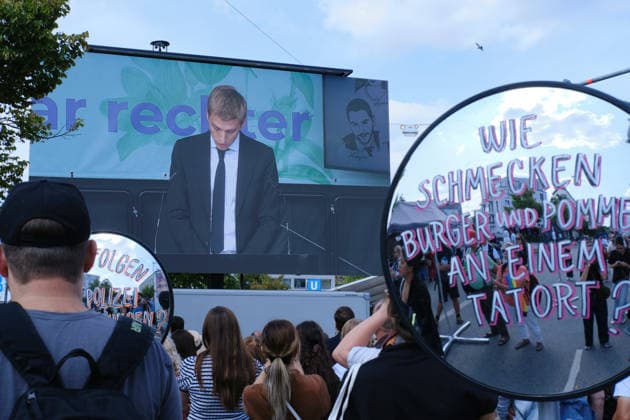 Germany marks 10th anniversary of Olympia shopping mall shooting MUNICH, GERMANY - JULY 22: Munich Mayor Dominik Krause appears on screen during the 10th anniversary memorial ceremony at Olympia shopping center in Munich, Germany, on July 22, 2026. The attack at Olympia Shopping Mall claimed nine lives and left several others injured before the gunman took his own life. Merve Goettl Anadolu Munich Germany. Editorial use only. Please get in touch for any other usage.  Copyright: x2026xAnadoluxMervexGoettlx