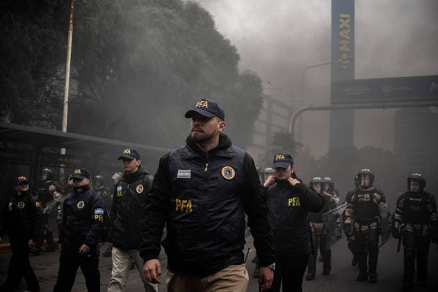 July 22, 2026, Buenos Aires, Buenos Aires, Argentina: Members of social organizations, labor unions and left-wing groups take part in a nationwide day of protest in Buenos Aires, Argentina, demanding increased social assistance, food programs and employment measures amid the country s ongoing economic crisis. Demonstrators marched at the PueyrredoÂ³n Bridge, where clashes erupted with federal security forces after police attempted to block the protest. The mobilization was part of coordinated actions held across Argentina. July 22, 2026. Buenos Aires Argentina  - ZUMAf175 20260722_zip_f175_011 Copyright: xDaniellaxFernandezxRealinx