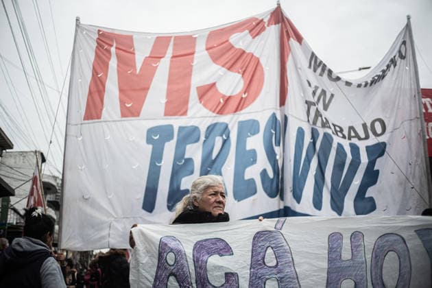July 22, 2026, Buenos Aires, Buenos Aires, Argentina: Members of social organizations, labor unions and left-wing groups take part in a nationwide day of protest in Buenos Aires, Argentina, demanding increased social assistance, food programs and employment measures amid the country s ongoing economic crisis. Demonstrators marched at the PueyrredoÂ³n Bridge, where clashes erupted with federal security forces after police attempted to block the protest. The mobilization was part of coordinated actions held across Argentina. July 22, 2026. Buenos Aires Argentina - ZUMAf175 20260722_zip_f175_018 Copyright: xDaniellaxFernandezxRealinx