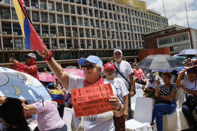 Maduro supporters gather in Caracas CARACAS, VENEZUELA - JULY 22: Government supporters and family members, including Nicolas Maduro Guerra, gather at the historic Plaza Caracas for a Patriots Gathering in Caracas, Venezuela, on July 22, 2026. The rally, which called for the release of Nicolas Maduro, coincided with his third hearing in a New York federal court, where the start of his trial was scheduled for June 1, 2027. Diko Betancourt Anadolu Caracas Venezuela. Editorial use only. Please get in touch for any other usage.  Copyright: x2026xAnadoluxDikoxBetancourtx