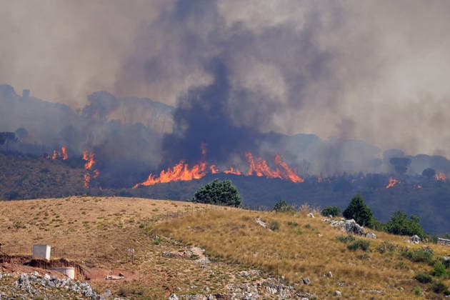 Wildfire firefighting efforts continue on Sicily island PALERMO, ITALY - JULY 22: Wildfires continue to burn in several parts of Sicily as firefighting efforts remain underway in Palermo, Sicily, Italy on July 22, 2026. Aircraft and helicopters are being used to battle a wildfire in the Casaboli forest, located in the mountainous area between the towns of Monreale and Pioppo near Palermo. Alberto Lo Bianco Anadolu Palermo Italy. Editorial use only. Please get in touch for any other usage.  Copyright: x2026xAnadoluxAlbertoxLoxBiancox
