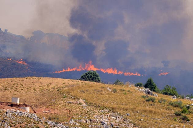 Wildfire firefighting efforts continue on Sicily island PALERMO, ITALY - JULY 22: Wildfires continue to burn in several parts of Sicily as firefighting efforts remain underway in Palermo, Sicily, Italy on July 22, 2026. Aircraft and helicopters are being used to battle a wildfire in the Casaboli forest, located in the mountainous area between the towns of Monreale and Pioppo near Palermo. Alberto Lo Bianco Anadolu Palermo Italy. Editorial use only. Please get in touch for any other usage.  Copyright: x2026xAnadoluxAlbertoxLoxBiancox
