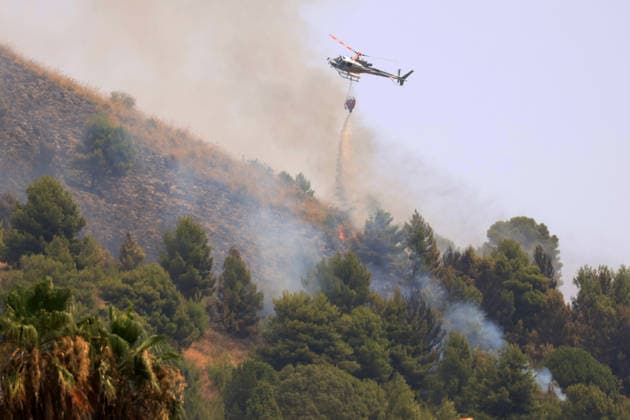 Wildfire firefighting efforts continue on Sicily island PALERMO, ITALY - JULY 22: Aircraft and helicopters battle as wildfires continue to burn in several parts of Sicily in the Casaboli forest, located in the mountainous area between the towns of Monreale and Pioppo near Palermo, Italy, on July 22, 2026. Alberto Lo Bianco Anadolu Palermo Italy. Editorial use only. Please get in touch for any other usage.  Copyright: x2026xAnadoluxAlbertoxLoxBiancox