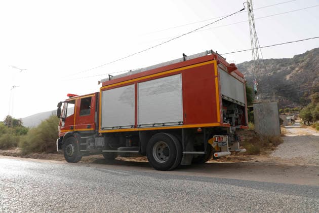 July 22, 2026, Bizerte, Bizerte, Tunisia, Tunisia: Scorched trees are seen on the hills overlooking the coast of Sidi Ali Mekki in the locality of Ghar El Melh on July 22, 2026 after being ravaged by a forest fire. Wildfires broke out the previous night in the heights of Ghar El Melh, Sidi Ali El Mekki, and RafRaf in Tunisia s Bizerte Governorate causing great concern among residents and vacationers. Bizerte Tunisia - ZUMAm342 20260722_zsp_m342_024 Copyright: xHasanxMradx