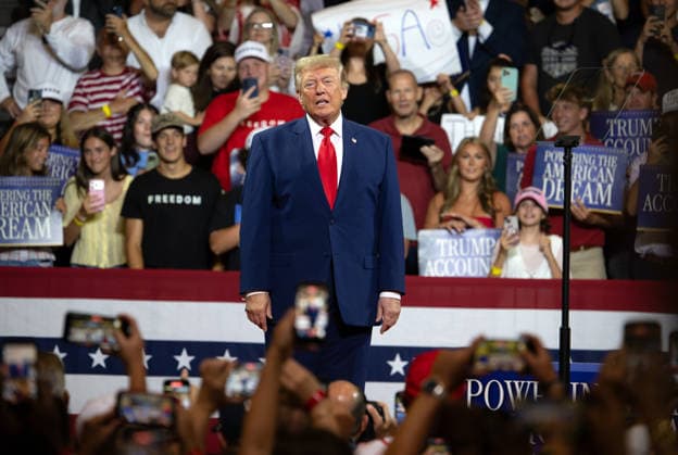 July 22, 2026, Marietta, Georgia, USA: President DONALD TRUMP greets crowd at a rally at Wheeler High School north of Atlanta. Marietta USA - ZUMAn03_ 20260722_zaf_n03_016 Copyright: xRobinxRaynex