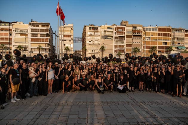 July 22, 2026, Izmir, Turkey: Animal rights activists seen posing for a photo after the march. Animal rights advocates held a silent march in Izmir, Turkey, to call for the protection of stray animals and their right to life. Following the march, participants issued a statement urging humane and permanent solutions for stray animals while calling on the public to defend the right to life and adopt animals from shelters or the streets. Izmir Turkey - ZUMAs197 20260722_aaa_s197_511 Copyright: xMuratxKocabasx