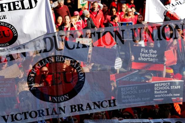 July 23, 2026, Melbourne, Australia: MELBOURNE, AUSTRALIA Ã¢â‚¬ JULY 23, 2026: Members of the Australian Education Union (AEU) march from Bourke Street Mall to the Victorian Parliament during a rally calling on the Victorian Government to fully fund public schools and present a revised Victorian Government Schools Agreement (VGSA). The demonstration forms part of statewide industrial action, with teachers and education support staff seeking improved pay, better working conditions and increased investment in public education. Melbourne Australia  - ZUMAq101 20260723_zna_q101_015 Copyright: xYexMyoxKhantx