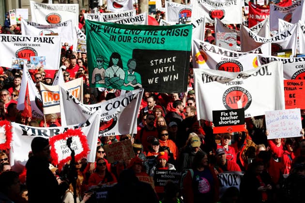The Victoria State Teachers Strike Protest in Melbourne - 23 Jul 2026 Protesters hold placards during the rally. Hundreds of members of the Australian Education Union (AEU) marched from Bourke Street Mall to the Victorian Parliament in Melbourne, calling for better pay, improved working conditions, increased public school funding, and a revised Victorian Government Schools Agreement (VGSA). Melbourne Australia Copyright: xYexMyoxKhantx xSOPAxImagesx YeMyoKhant_23